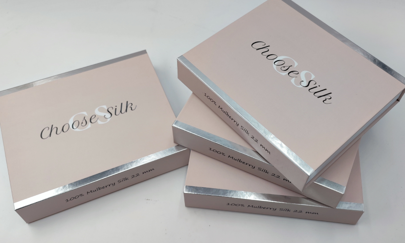 Stacked DreamSilk custom silk gift boxes for UK client brand