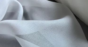 White silk chiffon fabric showing sheer translucent drape