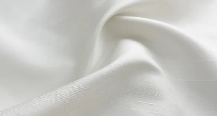 White silk dupioni fabric with crisp textured surface