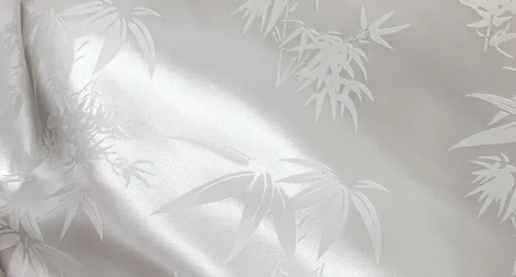 White silk viscose fabric showing soft blended surface