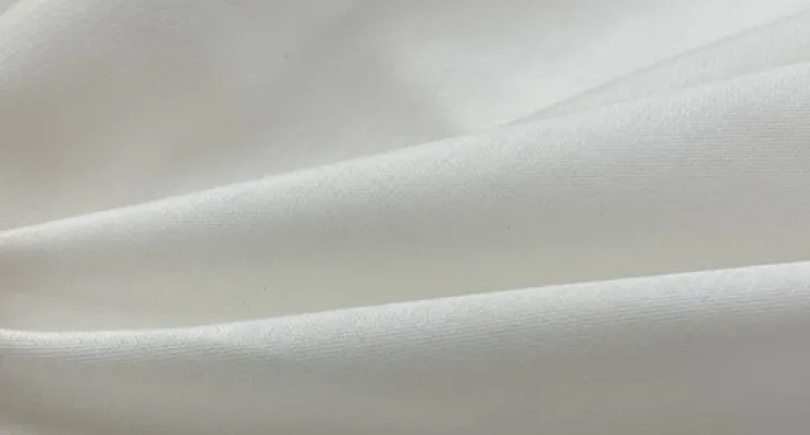 White silk cotton blend fabric with soft matte surface