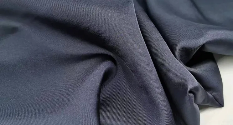 Black silk cotton fabric showing smooth blended texture