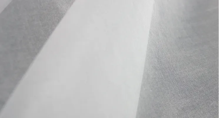 White silk organza fabric showing sheer transparency