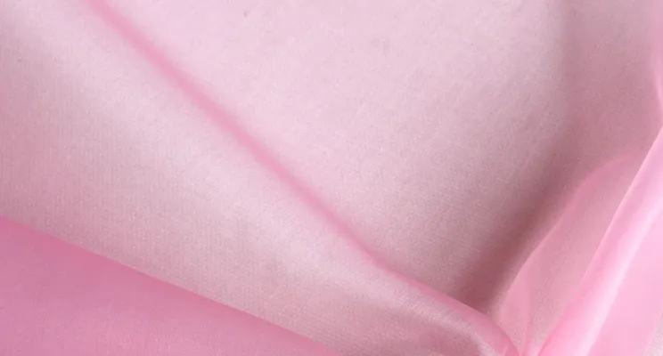 Pink silk organza fabric detail with delicate body
