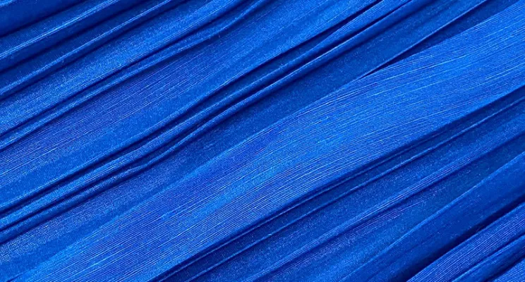 Navy silk linen fabric detail with textured depth