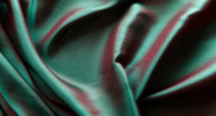 Iridescent silk dupioni fabric with dual-tone color shift
